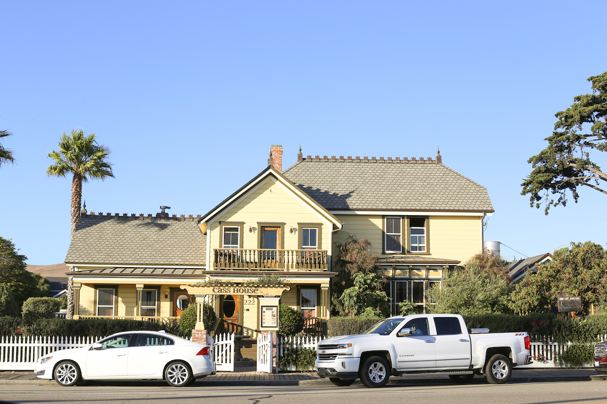 The historic yellow Cass House in Cayucos